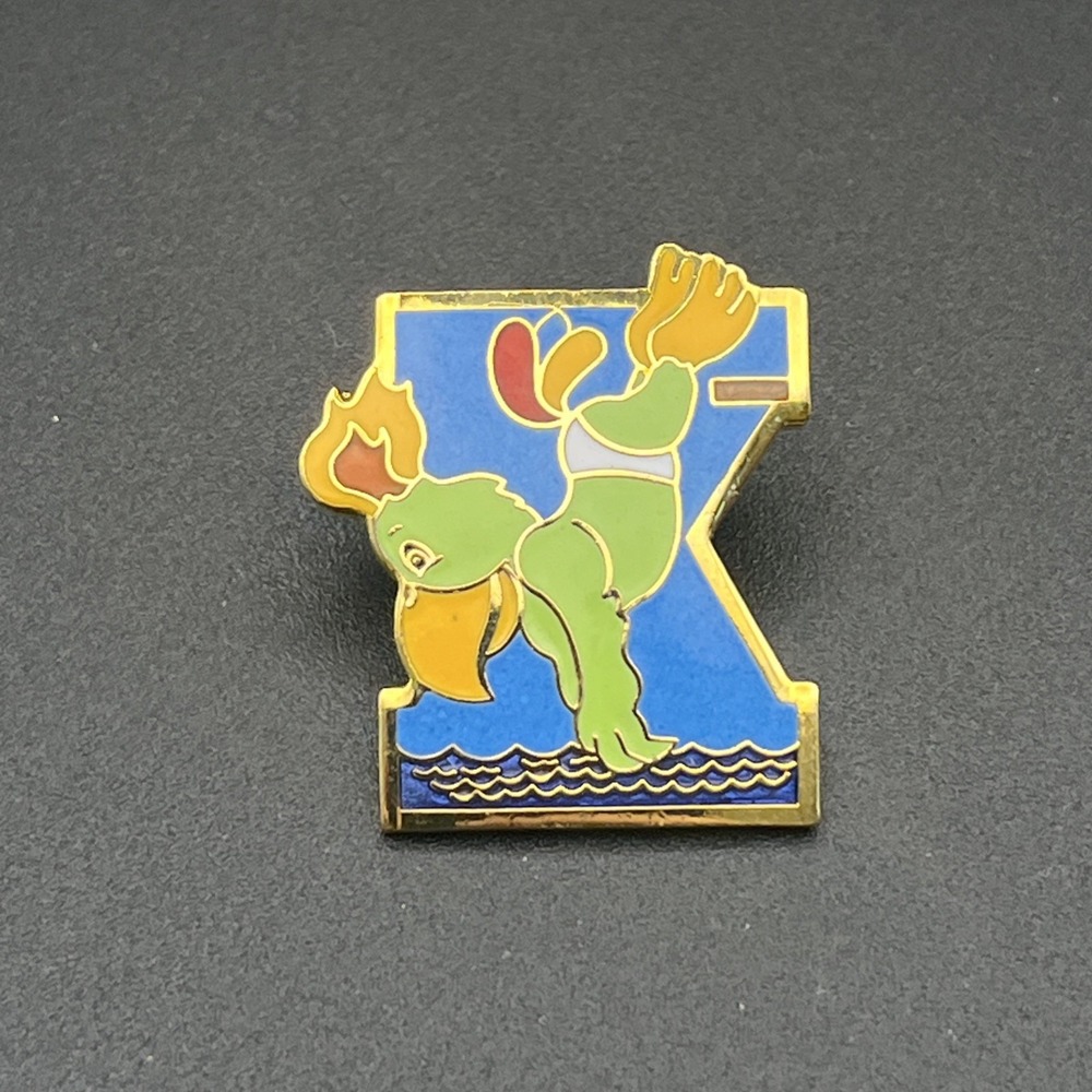 1987 Tenth Pan American Games Marsh Amigo Mascot Diving Lapel Hat Pin